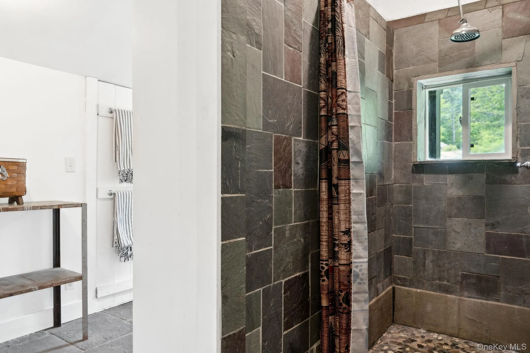 Bathroom with a tile shower Bathroom with a tile shower
