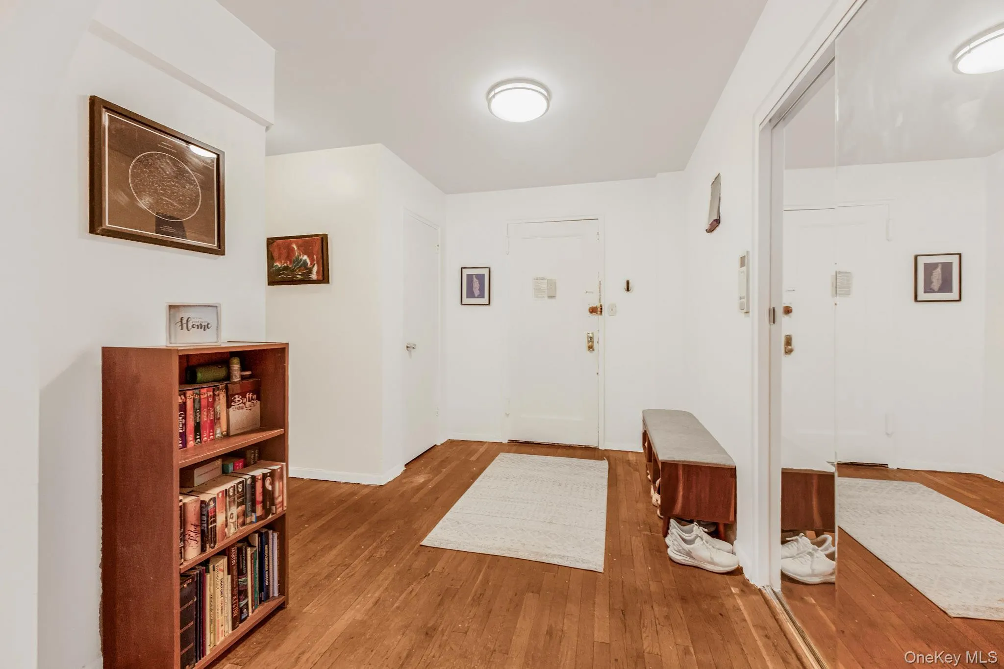 Foyer with hardwood / wood-style flooring Foyer with hardwood / wood-style flooring
