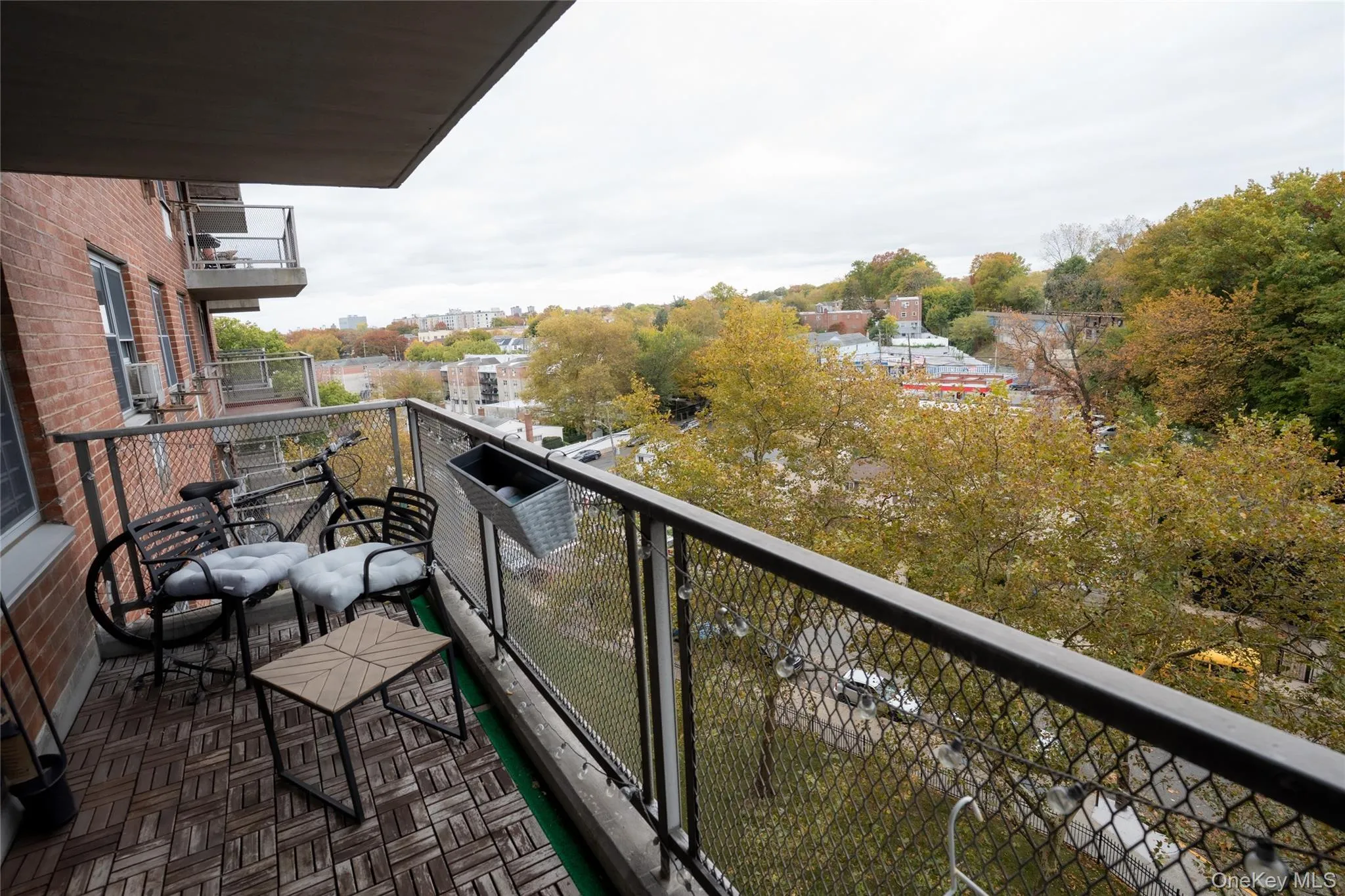 Balcony featuring view of wooded area Balcony featuring view of wooded area