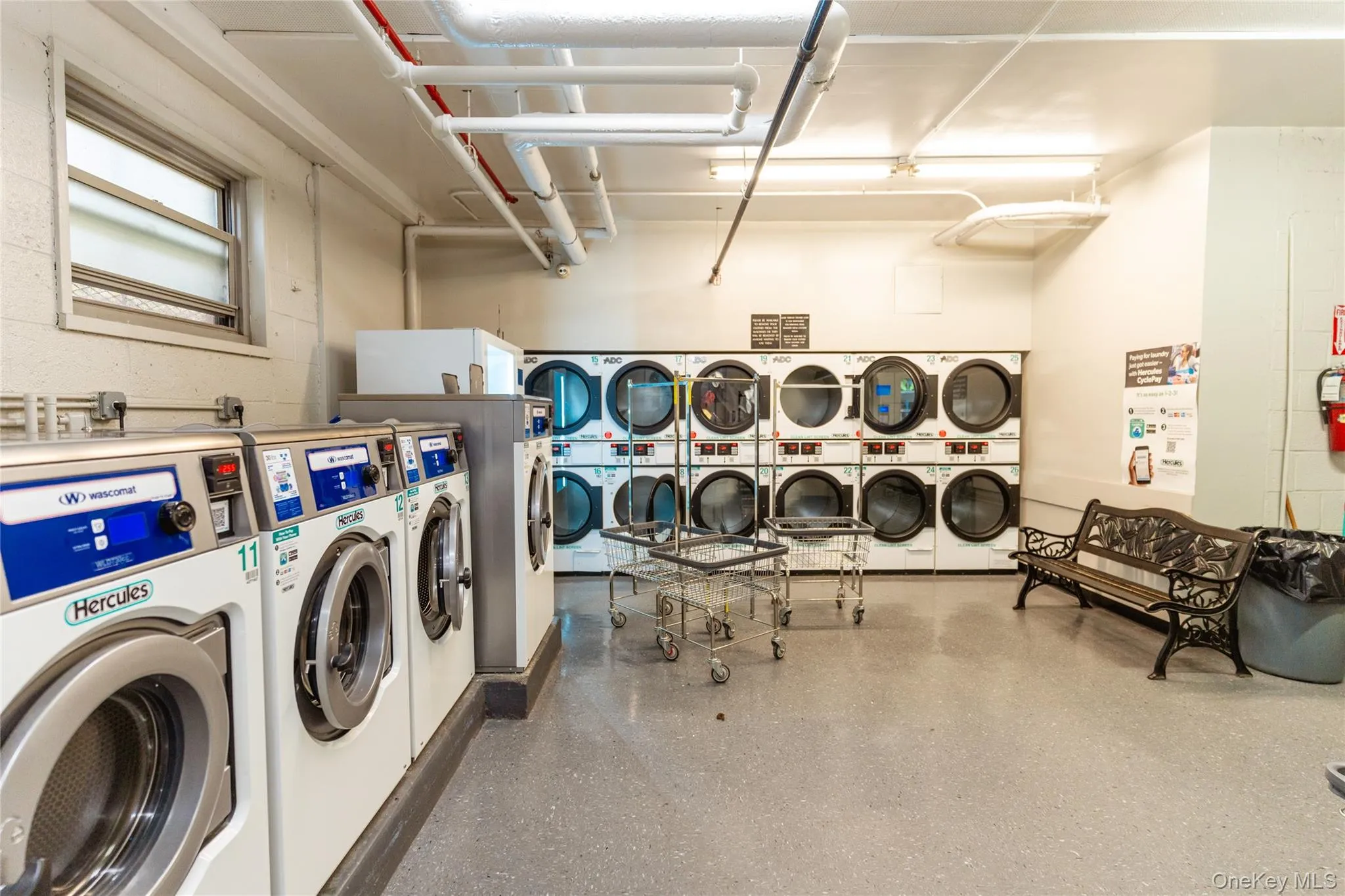 Community laundry with washer and clothes dryer and estacked washer and dryer Community laundry with washer and clothes dryer and estacked washer and dryer