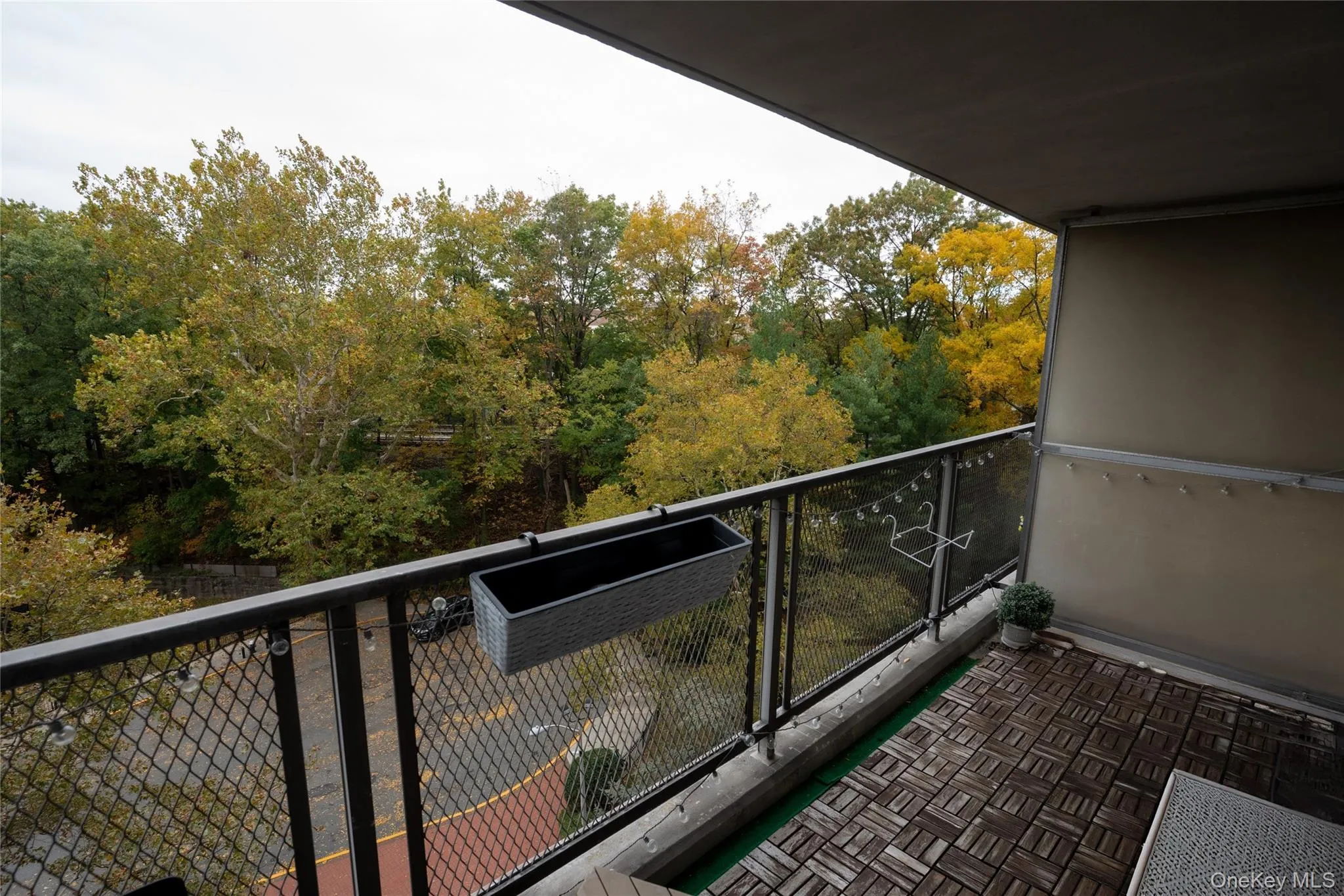 Balcony featuring view of wooded area Balcony featuring view of wooded area