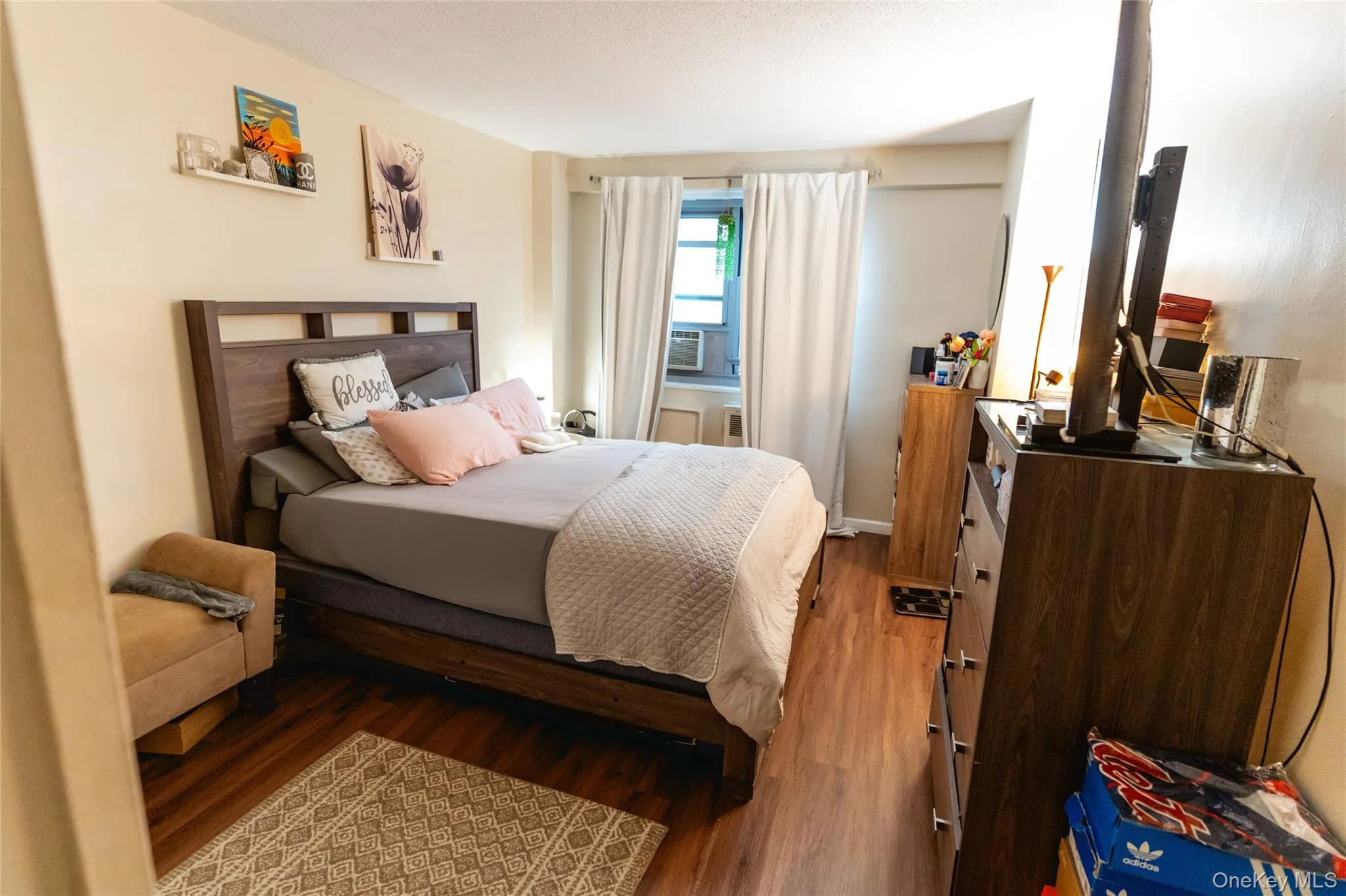 Bedroom with wood finished floors Bedroom with wood finished floors