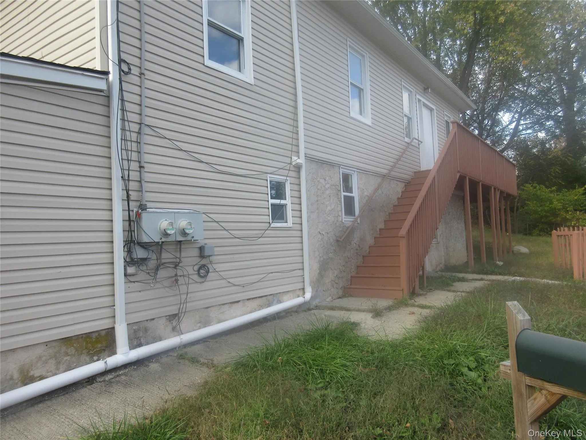 Back of property with stairs Back of property with stairs