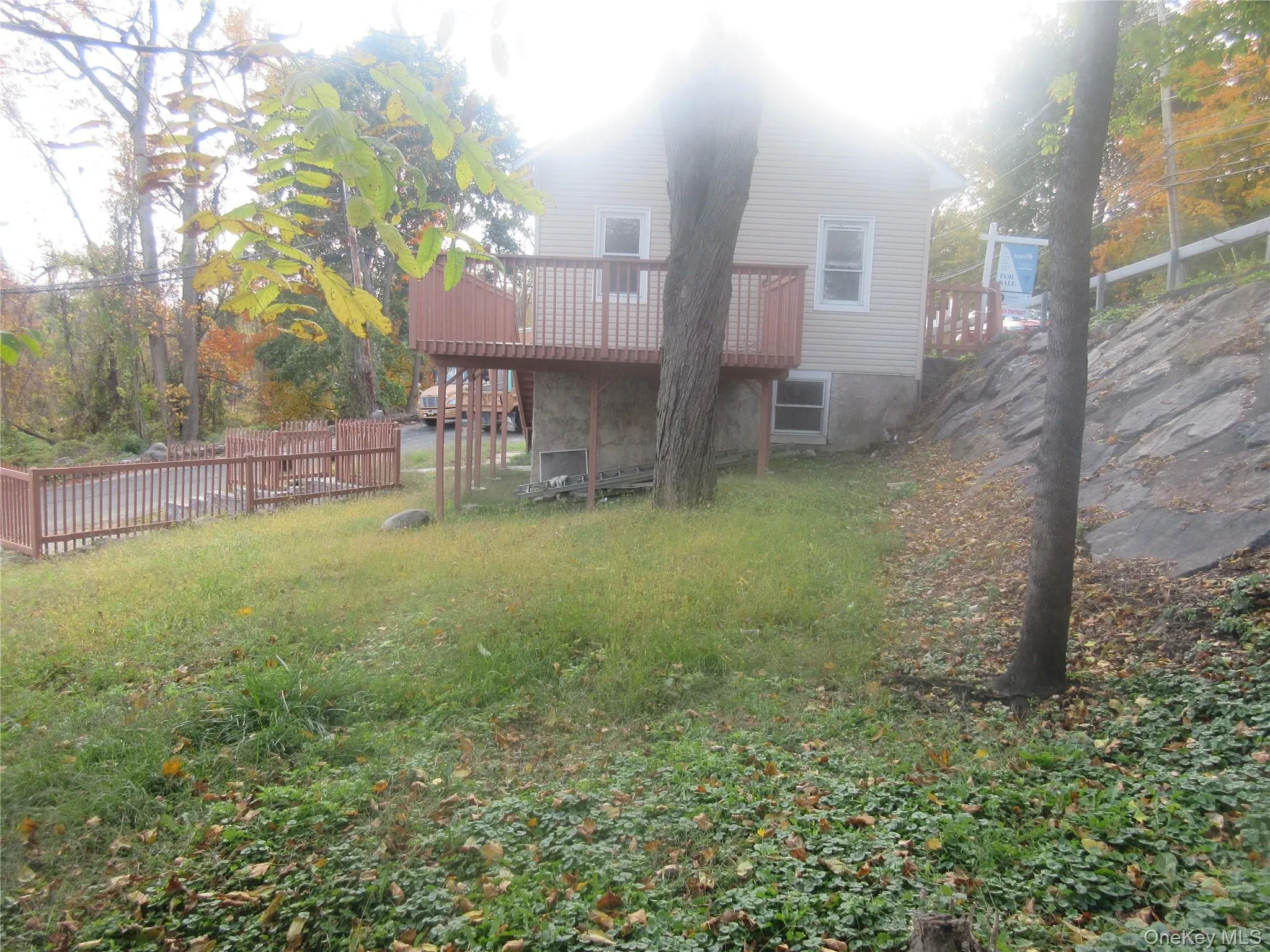View of yard featuring a wooden deck View of yard featuring a wooden deck