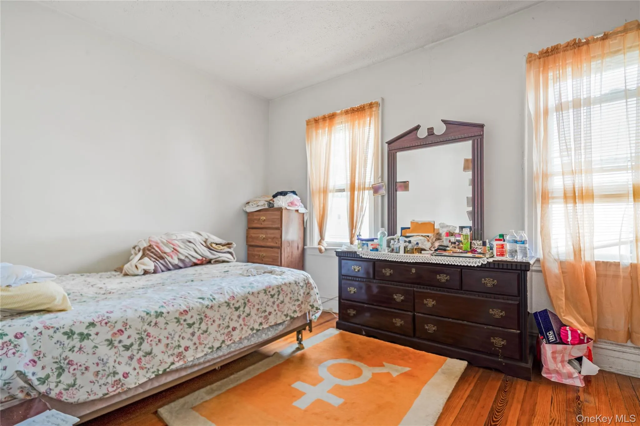 Bedroom with wood finished floors Bedroom with wood finished floors