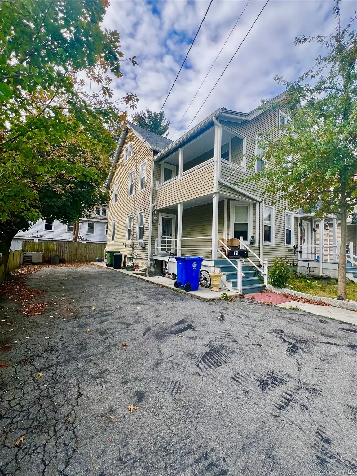 View of front of home with a balcony and a porch View of front of home with a balcony and a porch