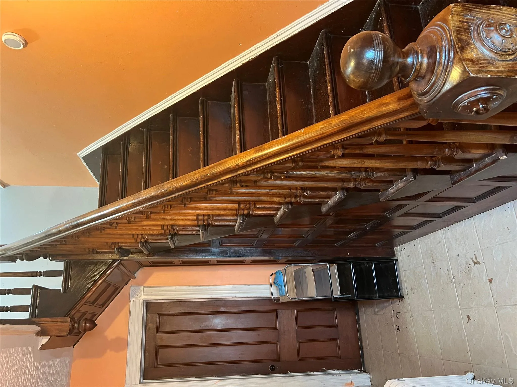 Stairway with tile patterned flooring and radiator Stairway with tile patterned flooring and radiator