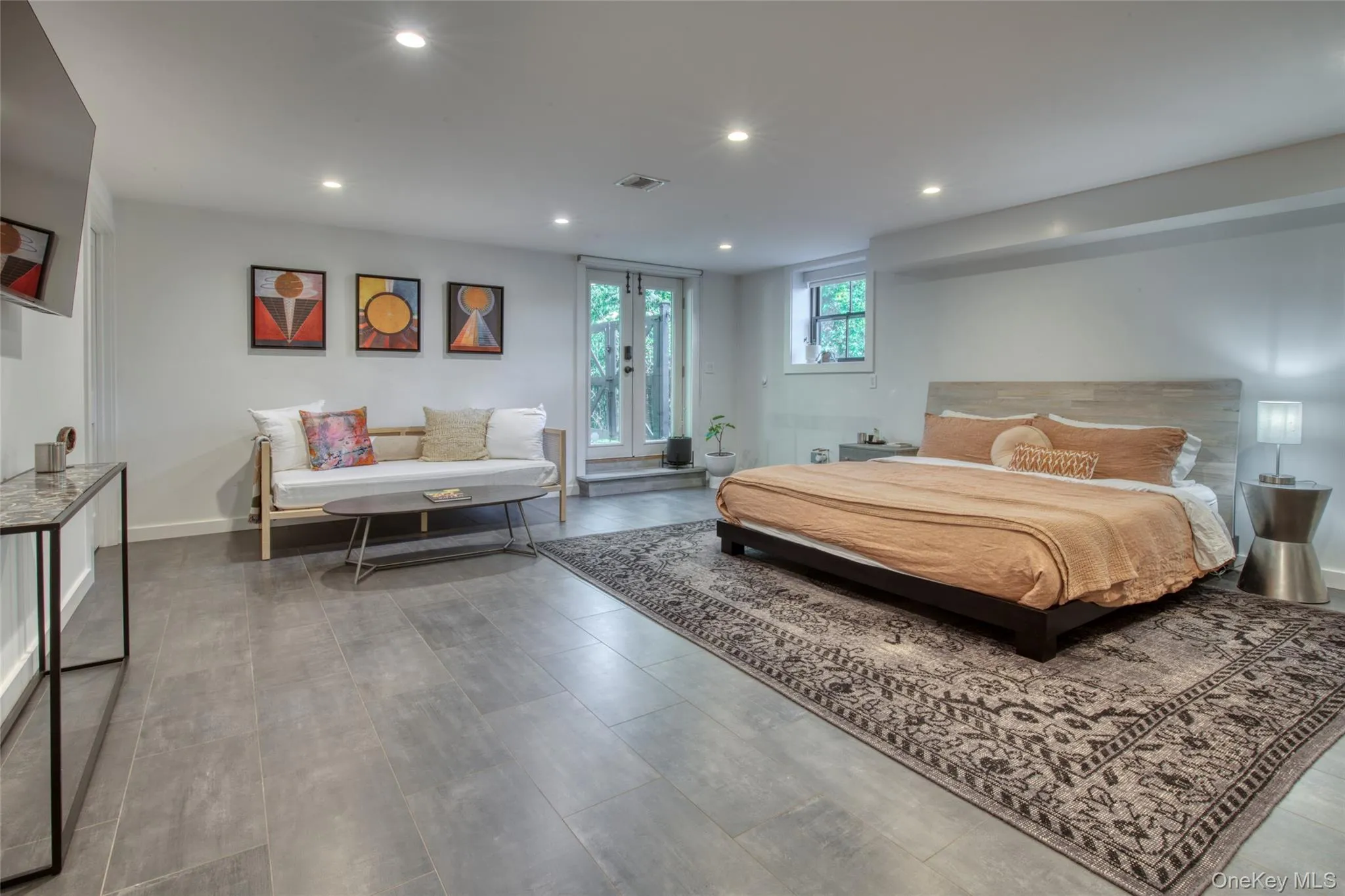 Bedroom featuring recessed lighting and dark wood-style floors Bedroom featuring recessed lighting and dark wood-style floors