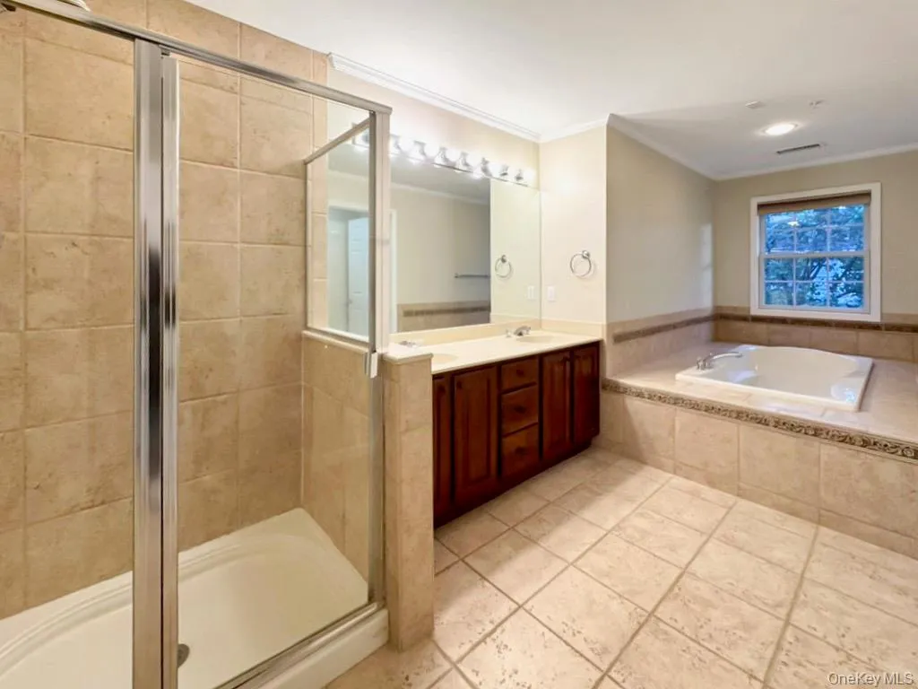 Upstair bathroom with shower, jacuzzi, and water closet Upstair bathroom with shower, jacuzzi, and water closet