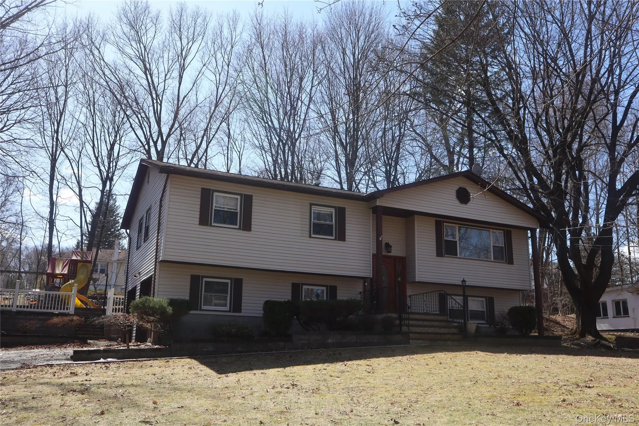 Split foyer home with a playground Split foyer home with a playground