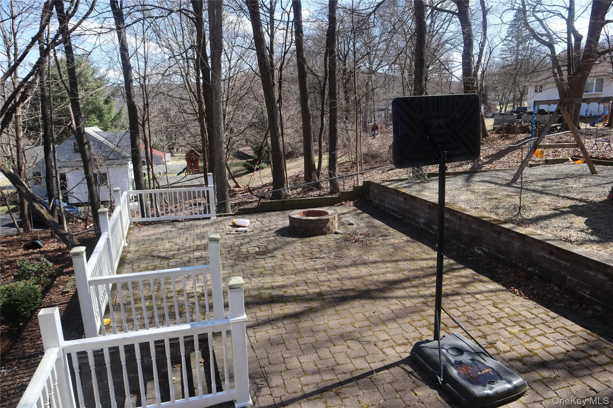 View of yard featuring a fire pit and a patio area View of yard featuring a fire pit and a patio area