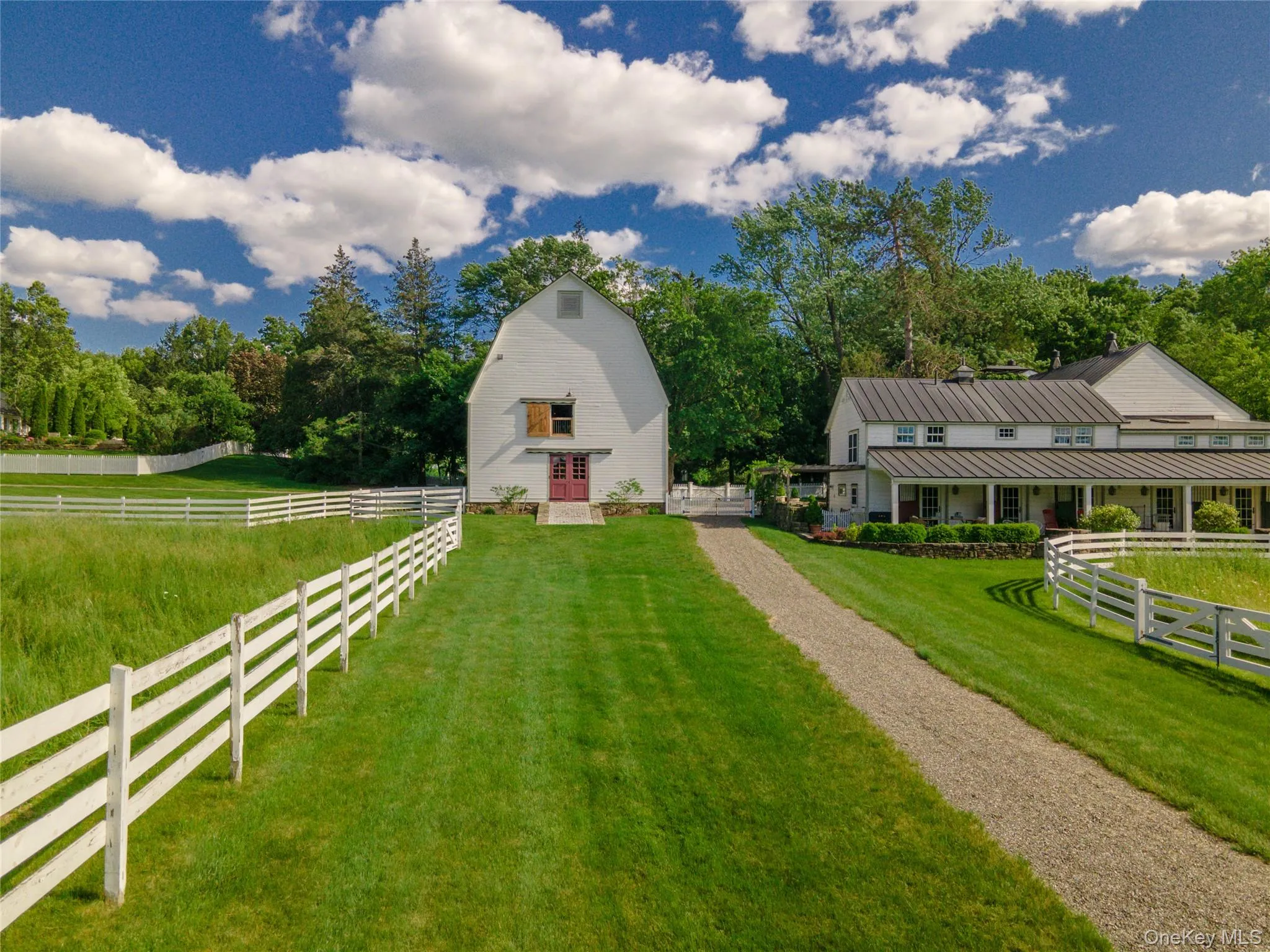 View of yard featuring a barn, a view of rural / pastoral area, an outdoor structure, and view of scattered trees View of yard featuring a barn, a view of rural / pastoral area, an outdoor structure, and view of scattered trees