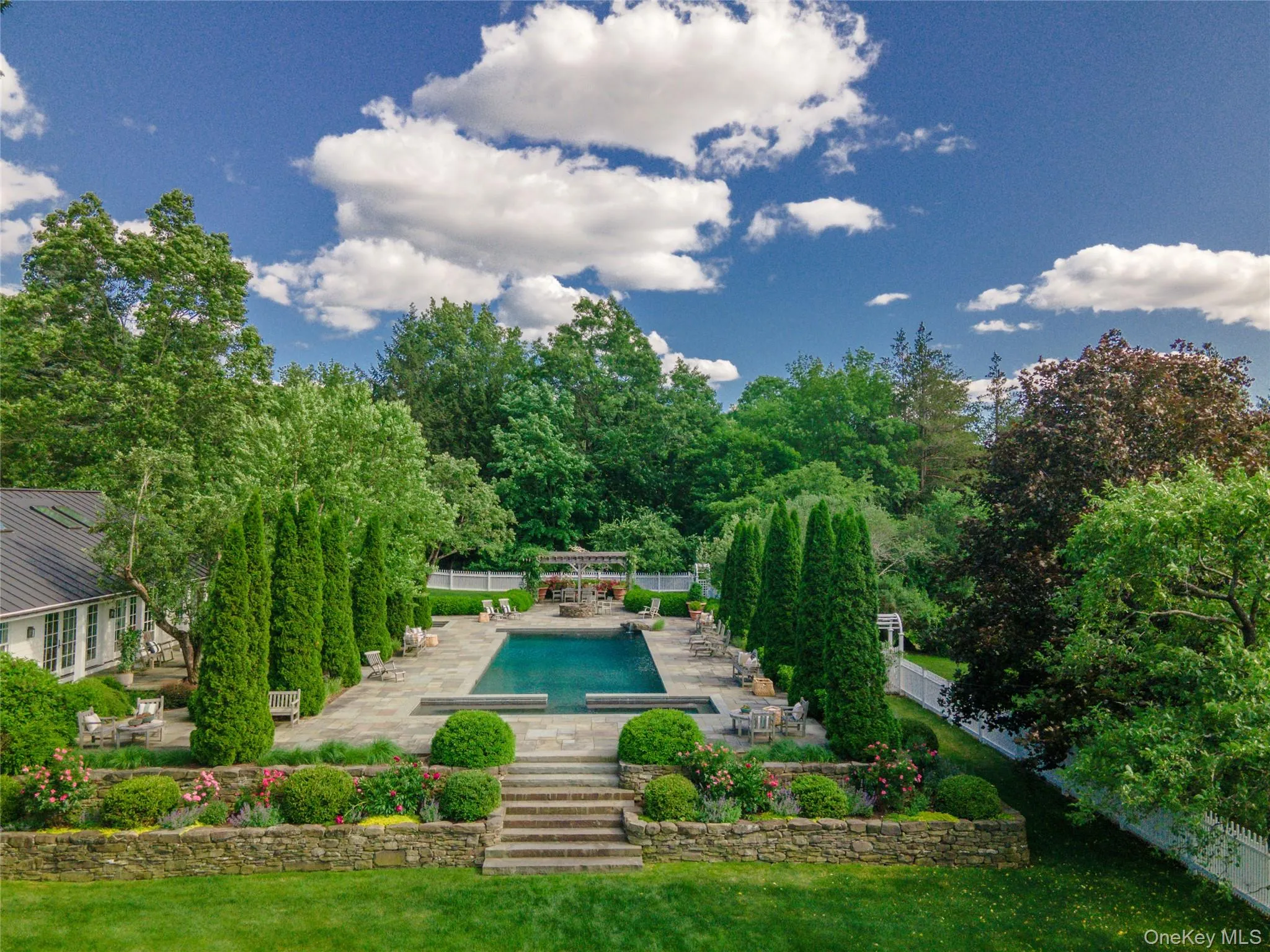 View of pool featuring a patio View of pool featuring a patio