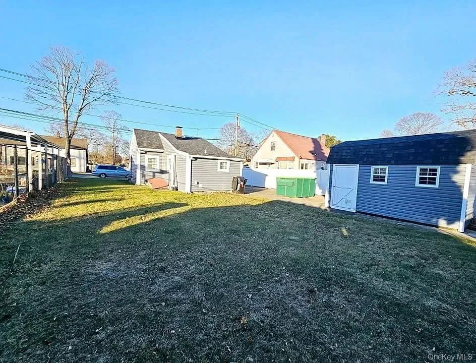 View of yard featuring a storage shed View of yard featuring a storage shed