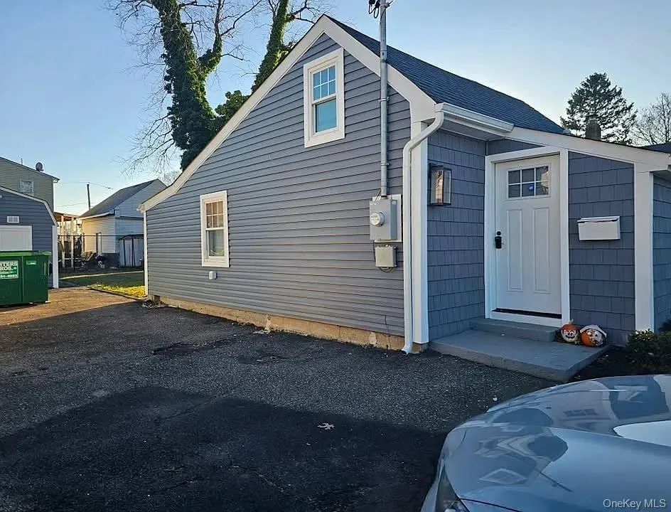 View of side of property featuring entry steps View of side of property featuring entry steps