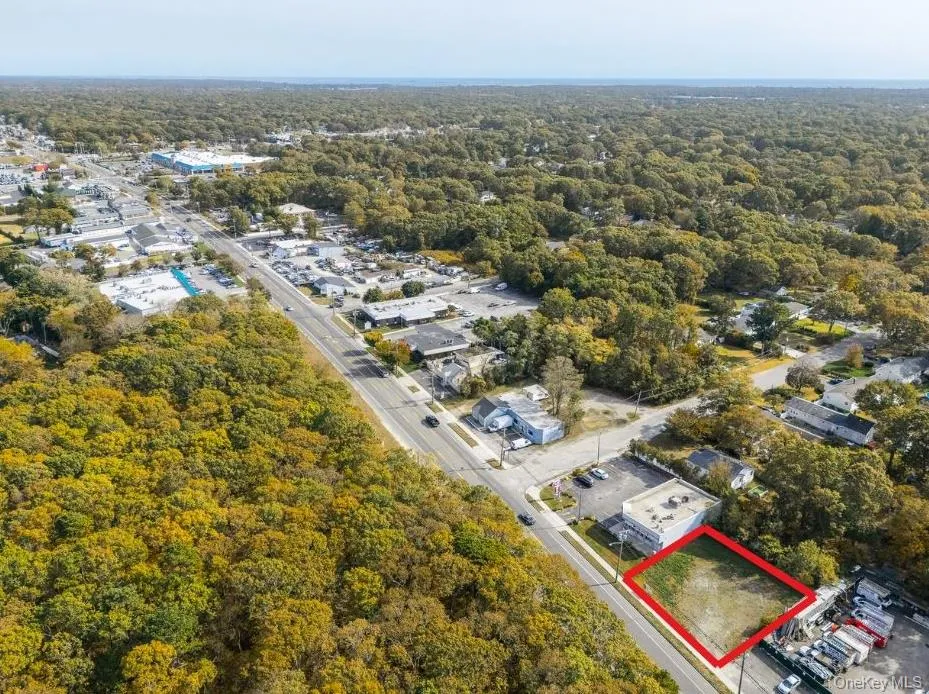 View of property location with a heavily wooded area and property parcel outlined View of property location with a heavily wooded area and property parcel outlined