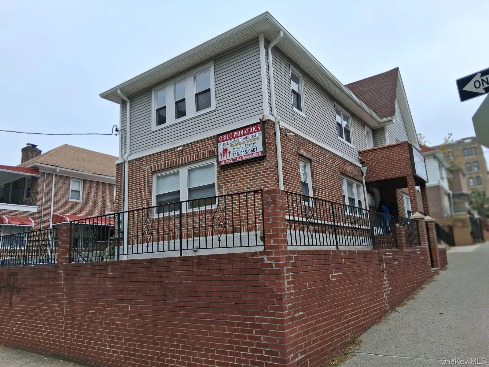 View of side of property featuring brick siding View of side of property featuring brick siding