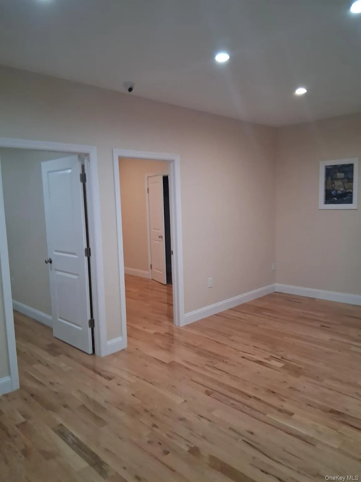 Spare room with recessed lighting and light wood-style floors Spare room with recessed lighting and light wood-style floors