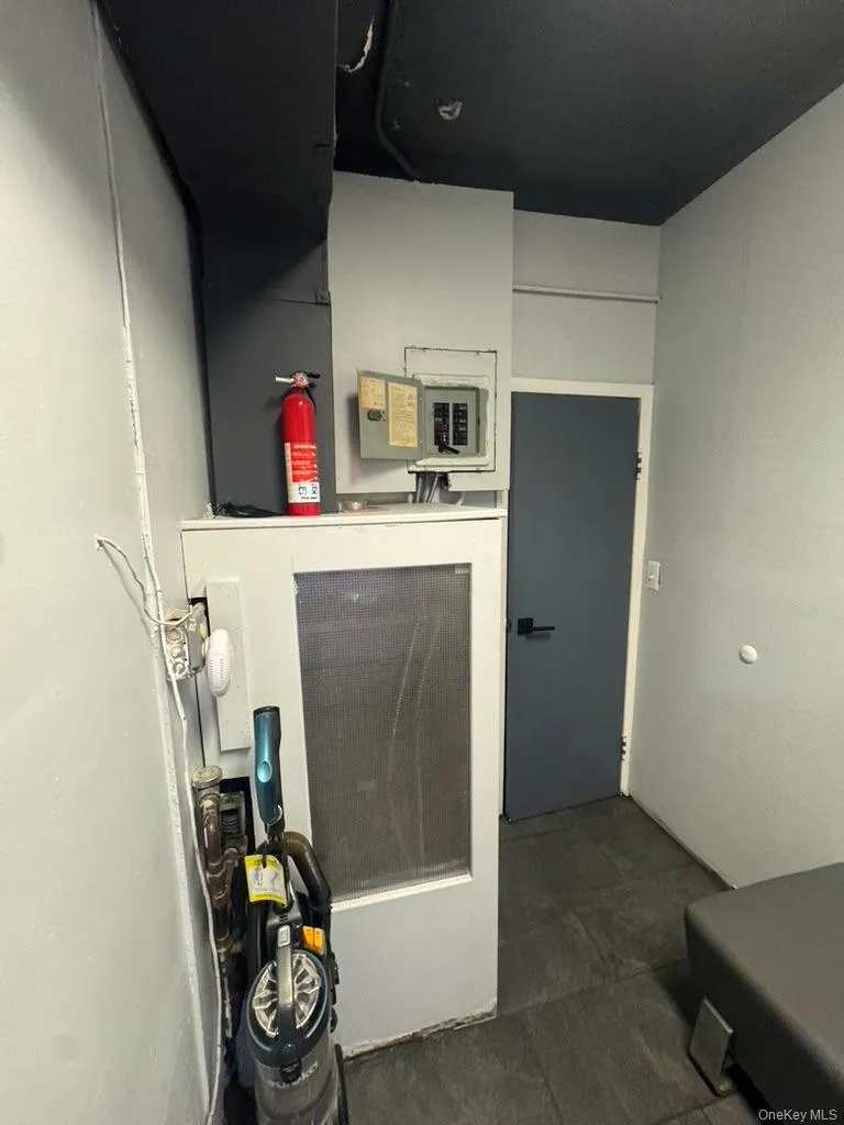 Utility room with electric panel Utility room with electric panel