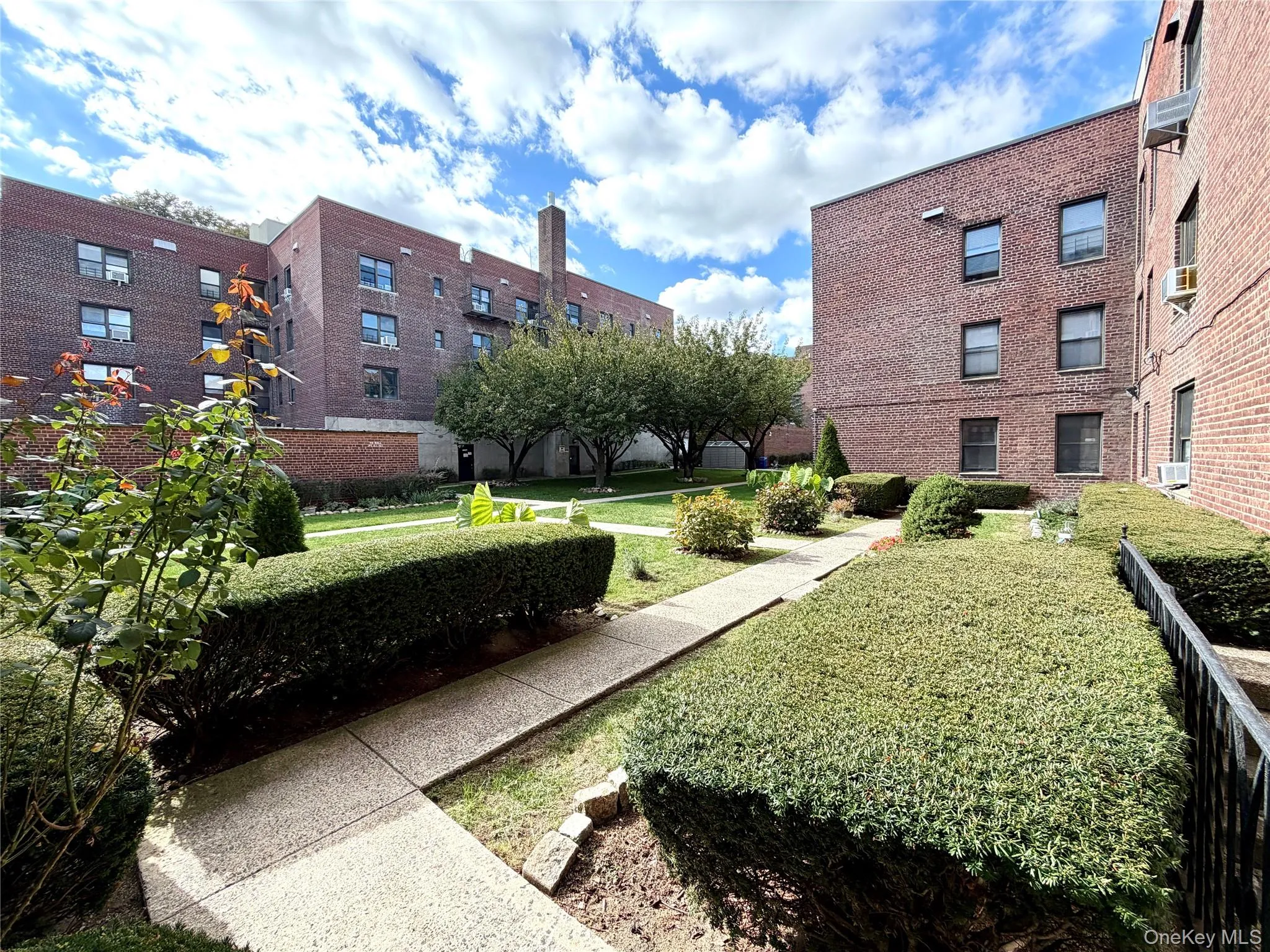 View of home's community with a yard View of home's community with a yard