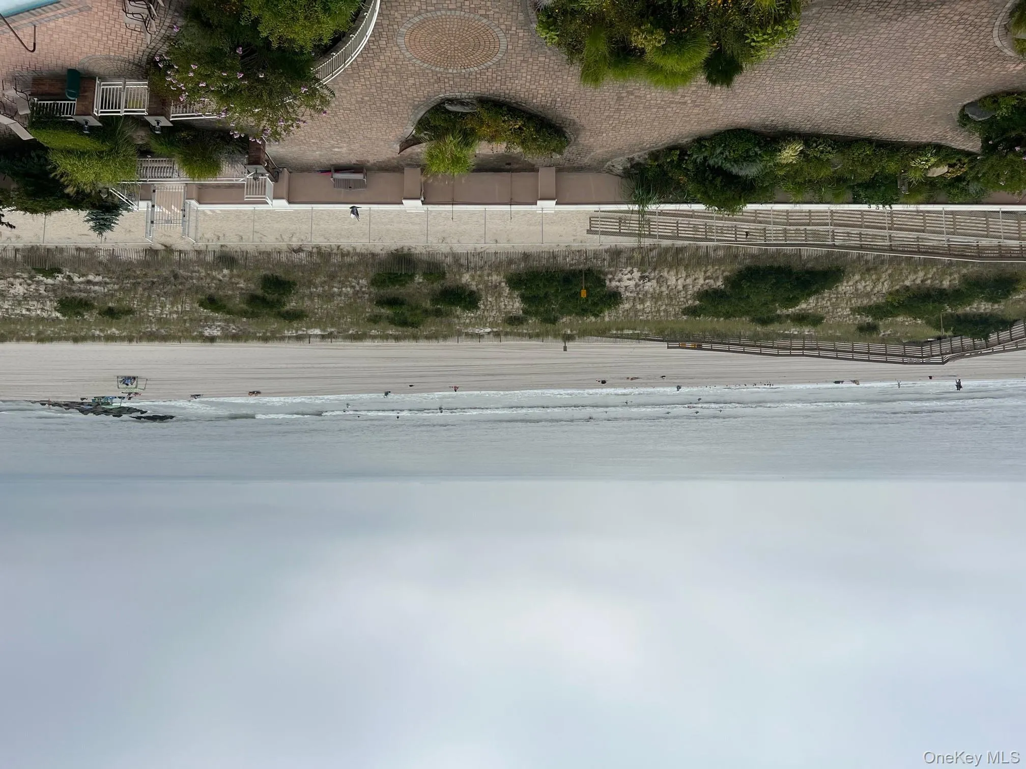 Water view featuring local beach Water view featuring local beach
