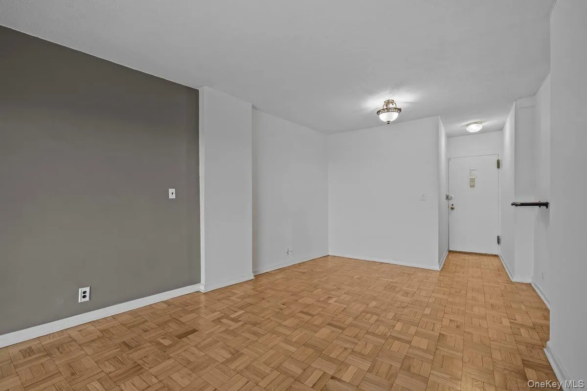 Spare room featuring baseboards Spare room featuring baseboards