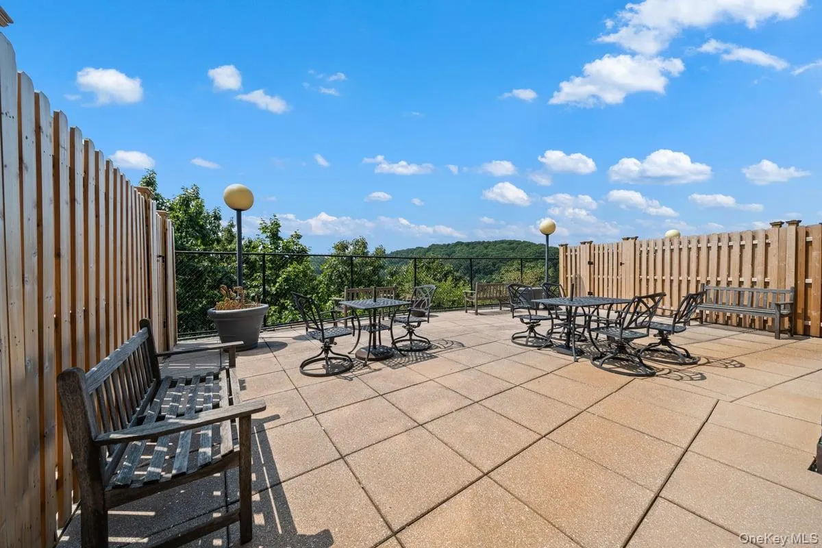 View of patio / terrace featuring outdoor dining area View of patio / terrace featuring outdoor dining area