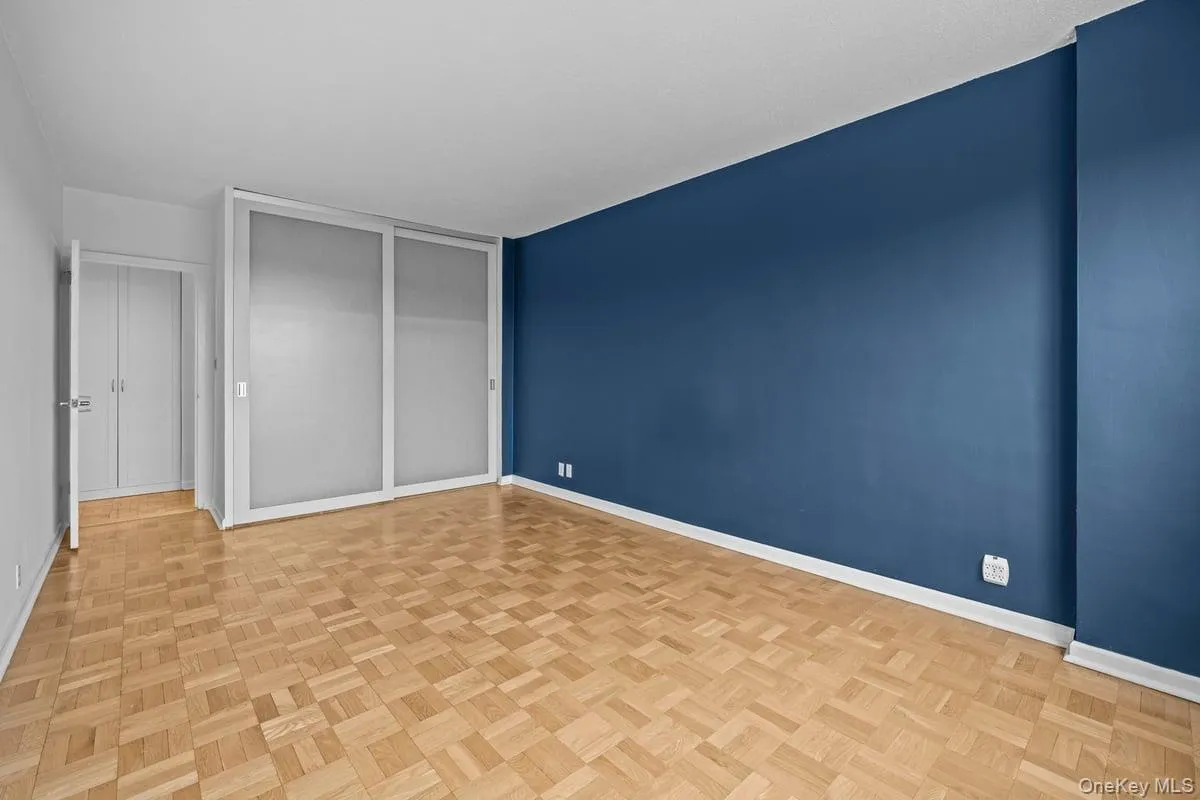 Unfurnished bedroom featuring baseboards and a closet Unfurnished bedroom featuring baseboards and a closet