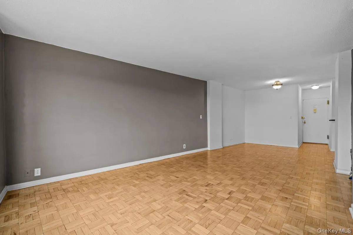 Empty room with baseboards Empty room with baseboards