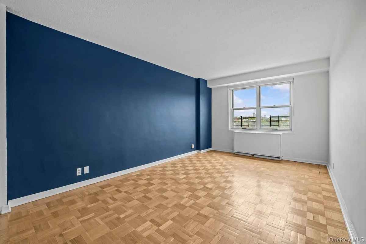Empty room with baseboards Empty room with baseboards