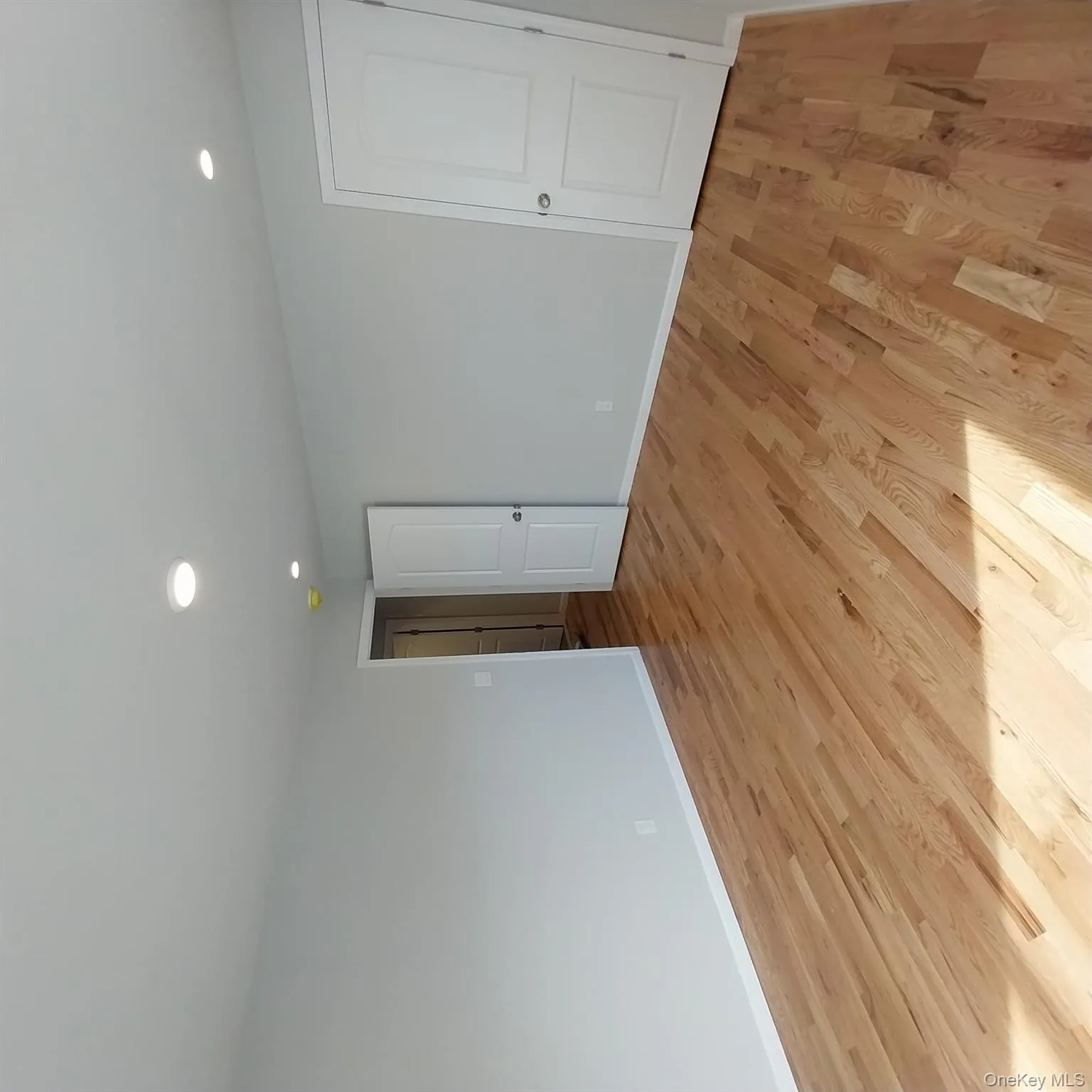 Empty room featuring recessed lighting and light wood finished floors Empty room featuring recessed lighting and light wood finished floors