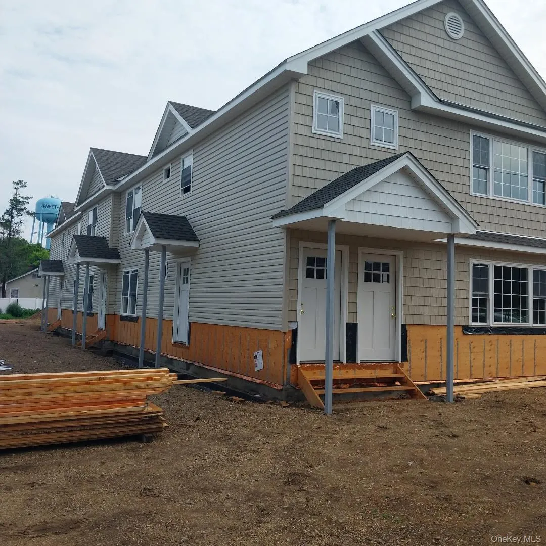 View of front of property with a shingled roof and crawl space View of front of property with a shingled roof and crawl space