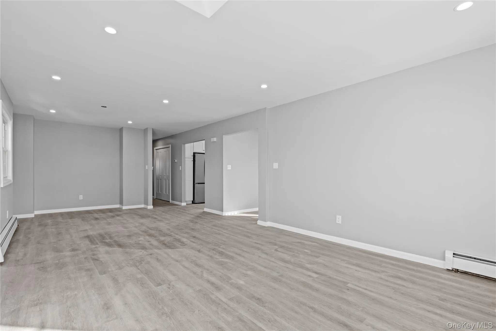 Spare room with recessed lighting and light wood-style flooring Spare room with recessed lighting and light wood-style flooring