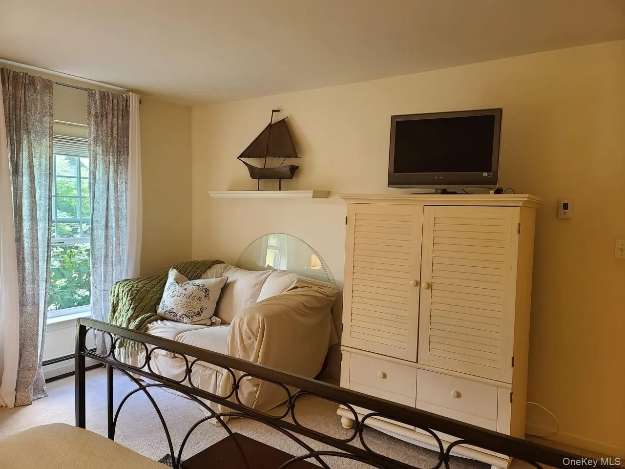 Bedroom featuring baseboards Bedroom featuring baseboards