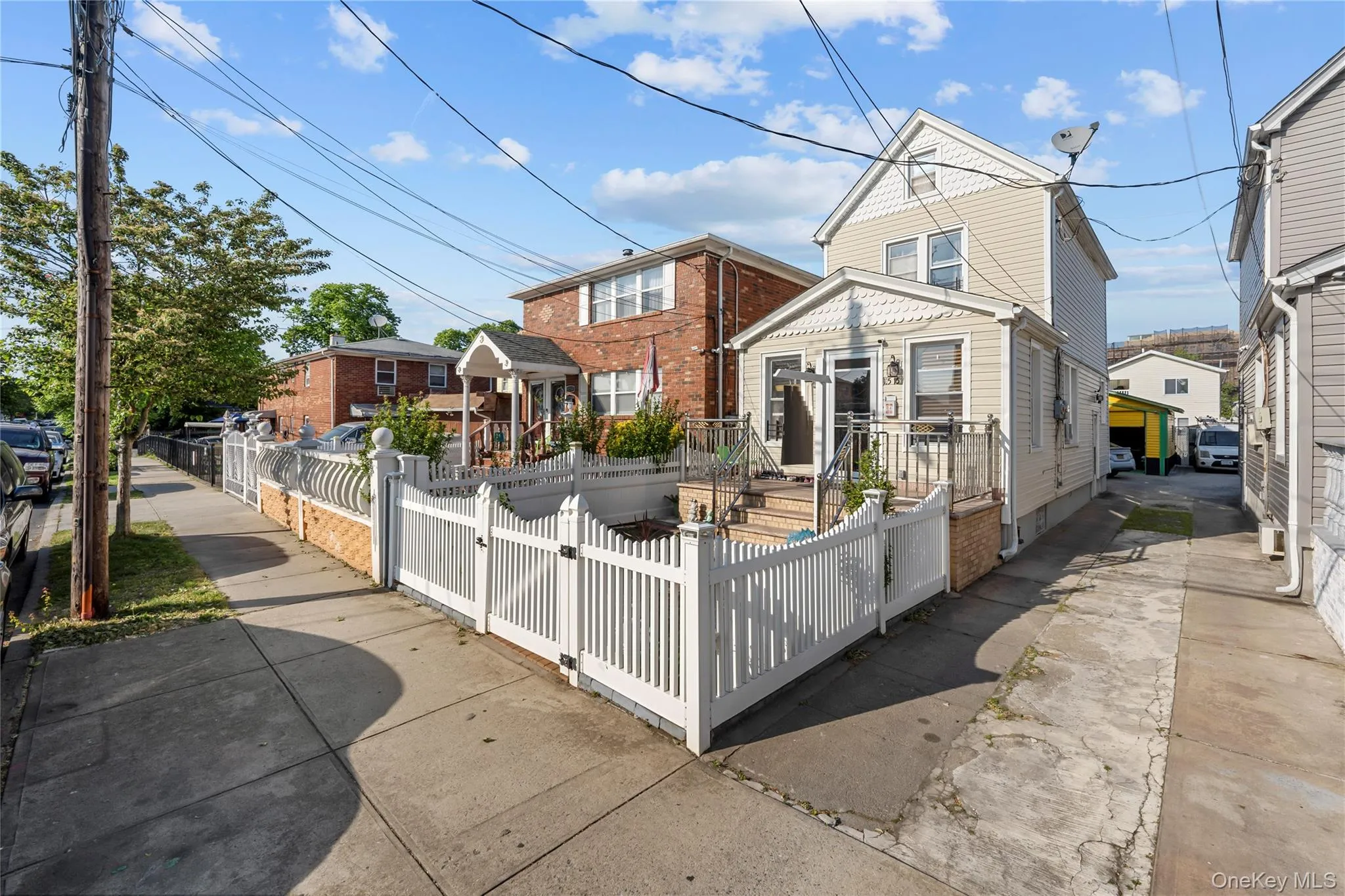 View of front of house featuring a fenced front yard and a gate View of front of house featuring a fenced front yard and a gate