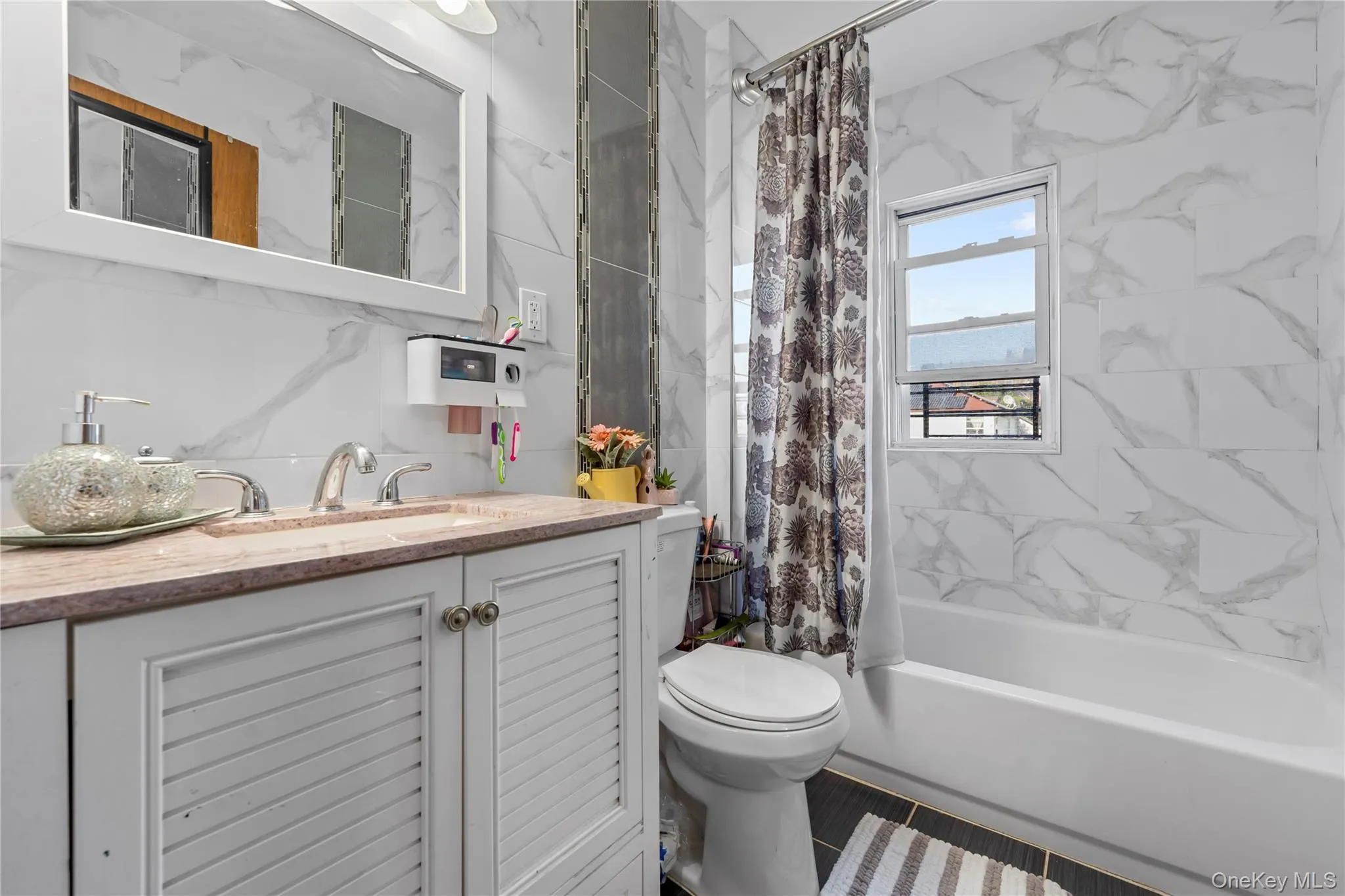 Full bath with shower / bath combo with shower curtain and vanity Full bath with shower / bath combo with shower curtain and vanity