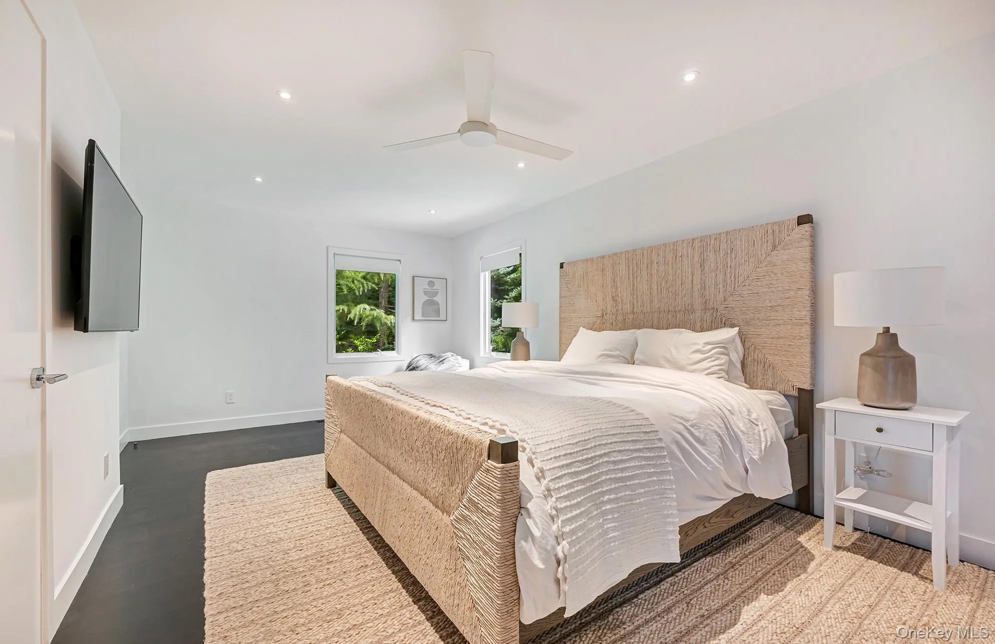 Bedroom with recessed lighting, ceiling fan, and dark wood-style flooring Bedroom with recessed lighting, ceiling fan, and dark wood-style flooring