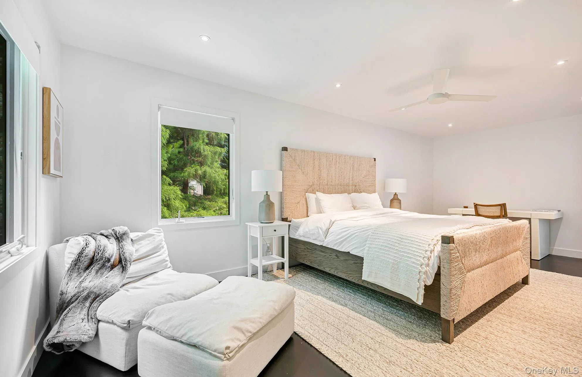 Bedroom with recessed lighting, a ceiling fan, and wood finished floors Bedroom with recessed lighting, a ceiling fan, and wood finished floors