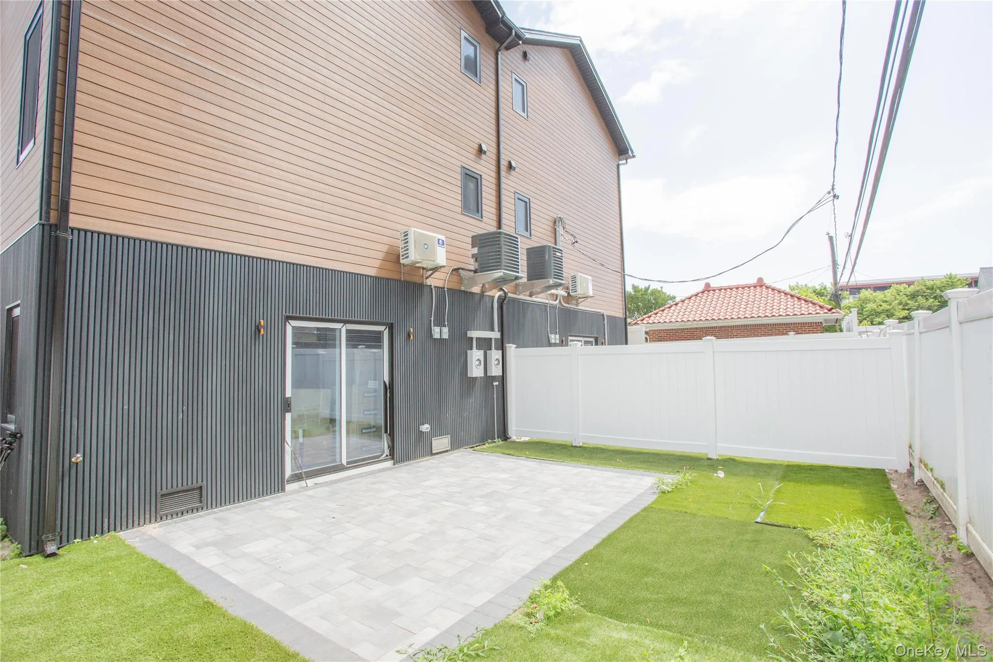 Rear view of property featuring a patio and a fenced backyard Rear view of property featuring a patio and a fenced backyard