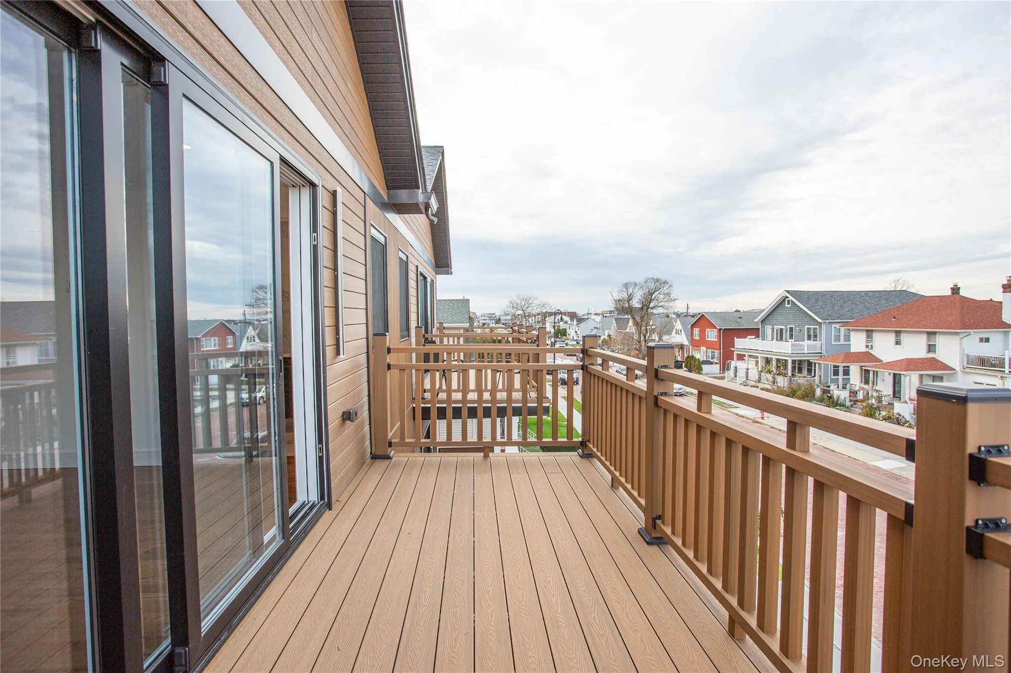 Wooden terrace with a residential view Wooden terrace with a residential view