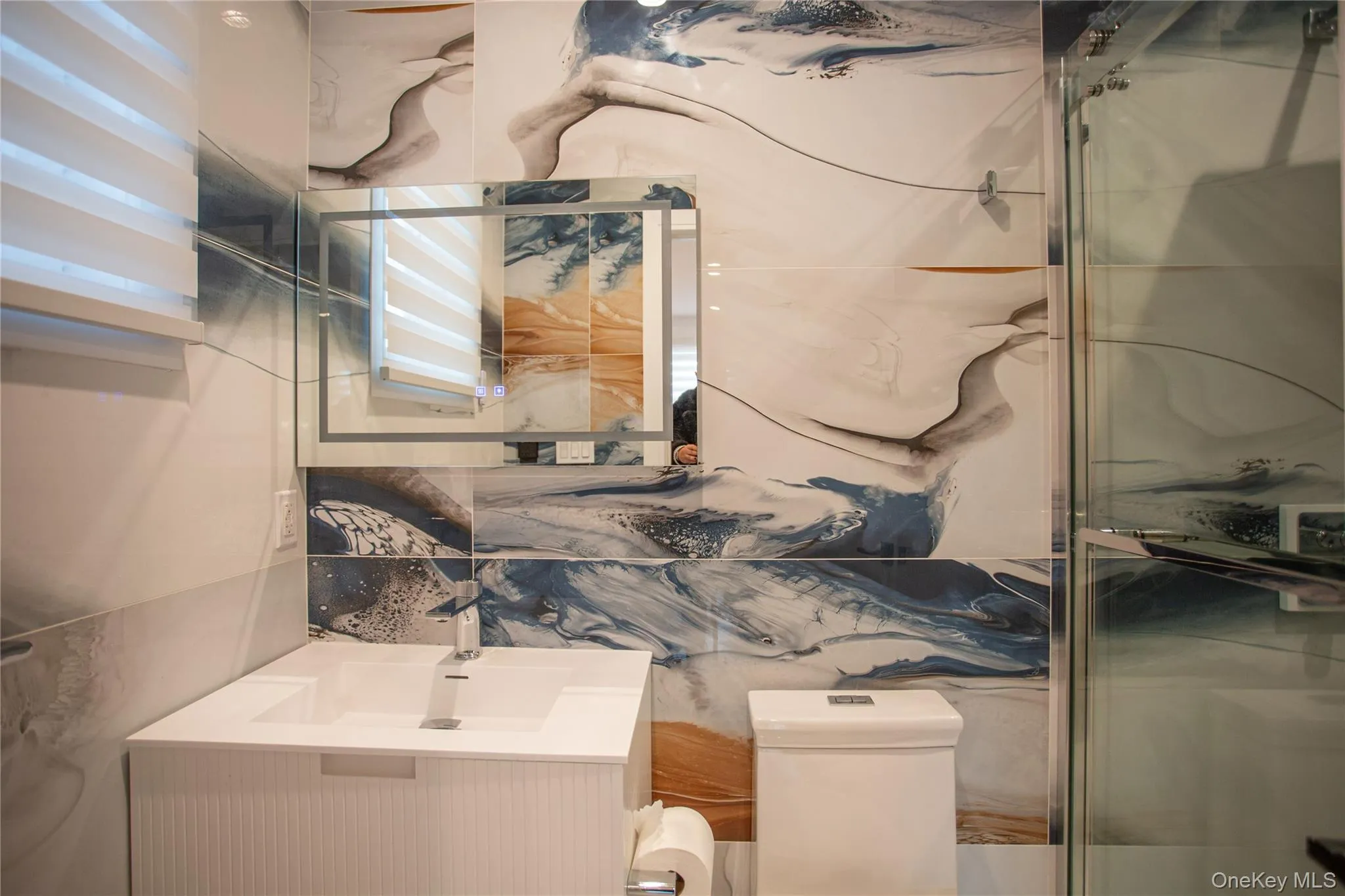 Full bathroom featuring vanity and toilet Full bathroom featuring vanity and toilet