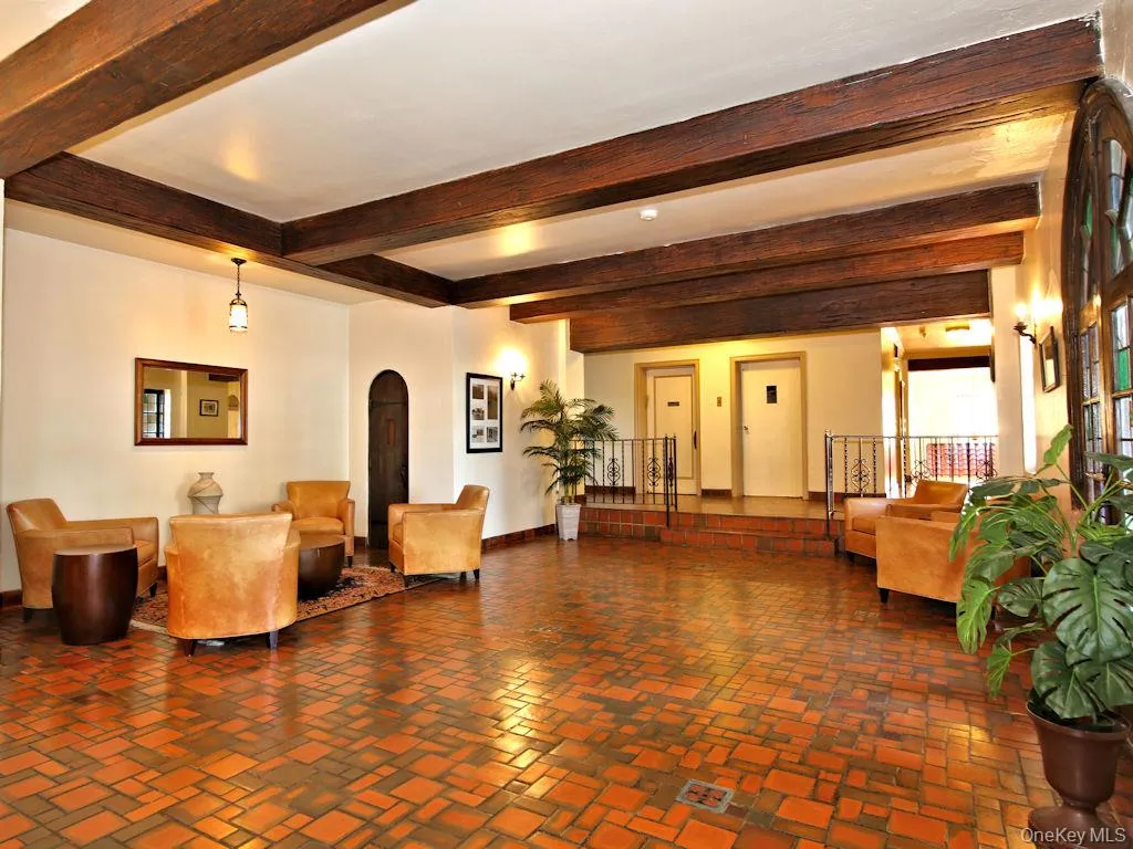 Lobby featuring beamed ceiling Lobby featuring beamed ceiling