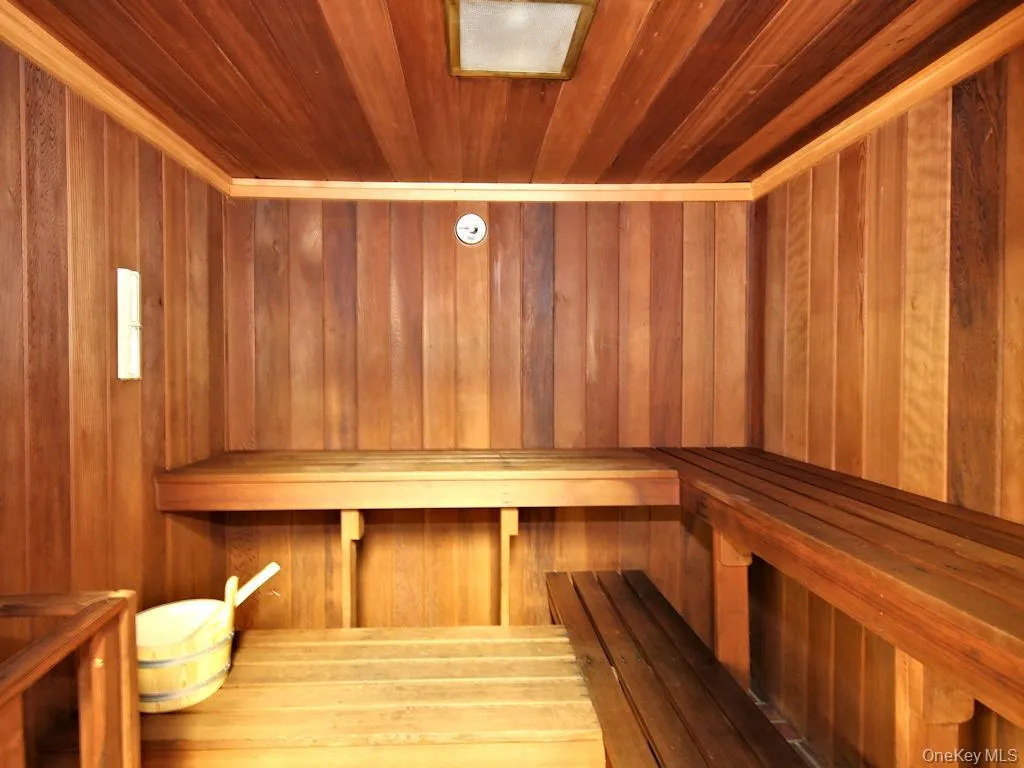 Sauna featuring wood ceiling Sauna featuring wood ceiling