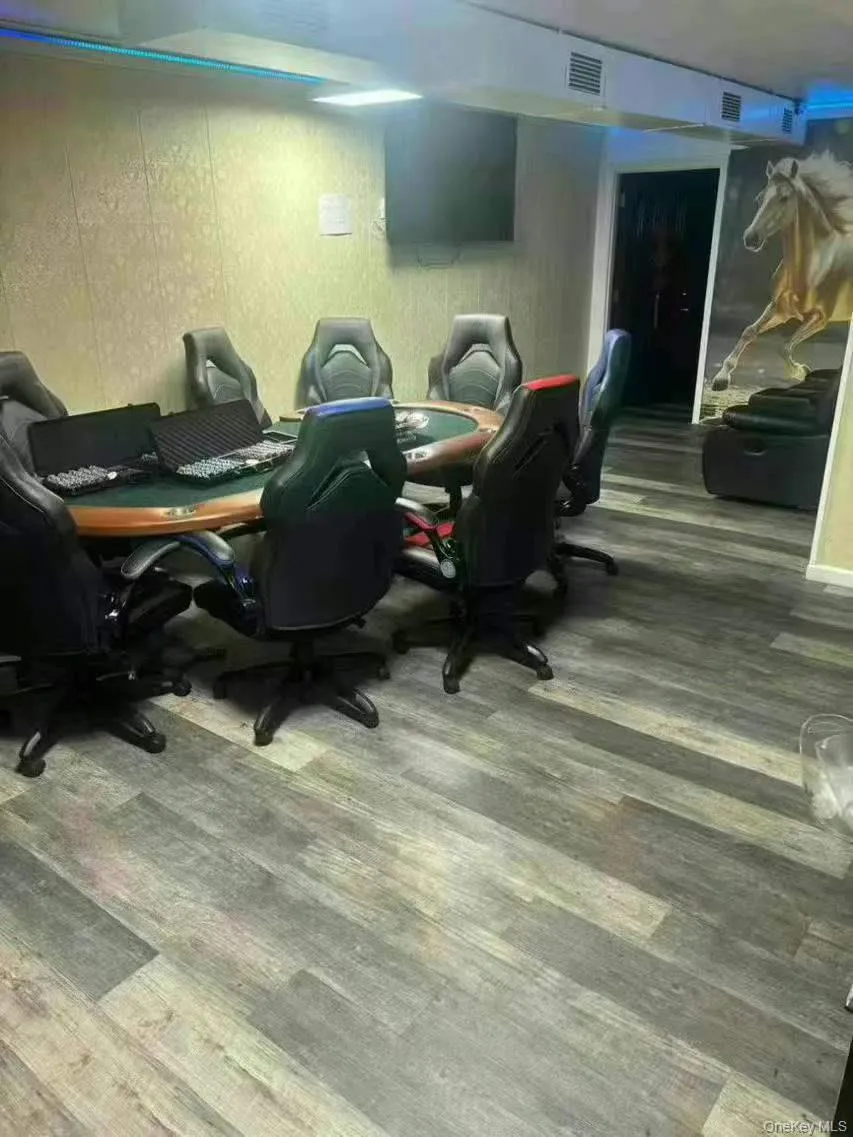 Office area with wood finished floors Office area with wood finished floors