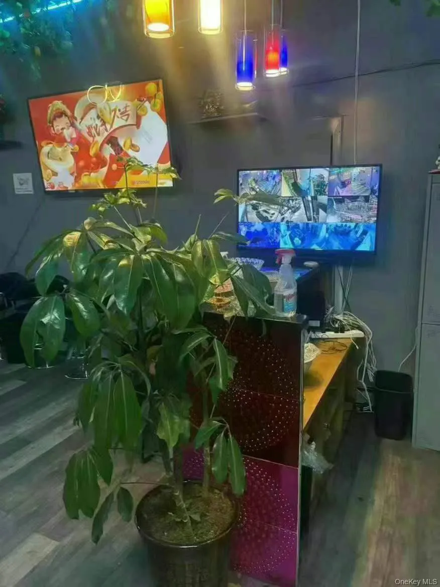 Living area featuring wood finished floors Living area featuring wood finished floors