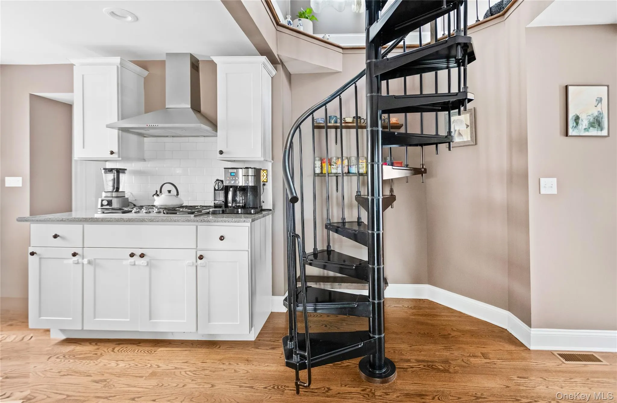 Stairs with wood finished floors and baseboards Stairs with wood finished floors and baseboards