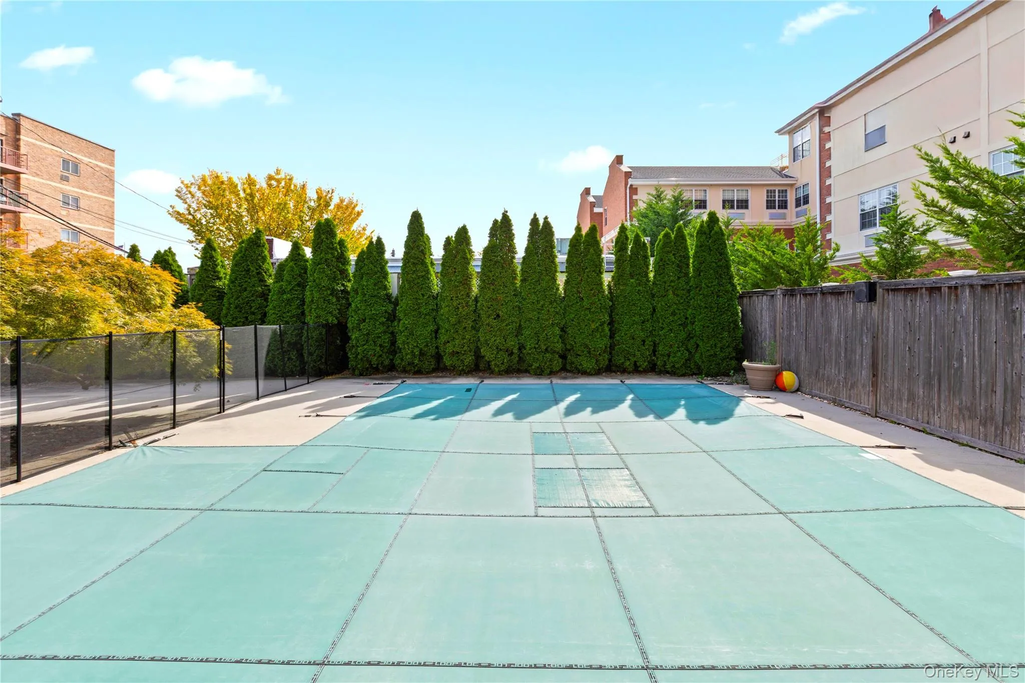 View of pool featuring a patio area View of pool featuring a patio area