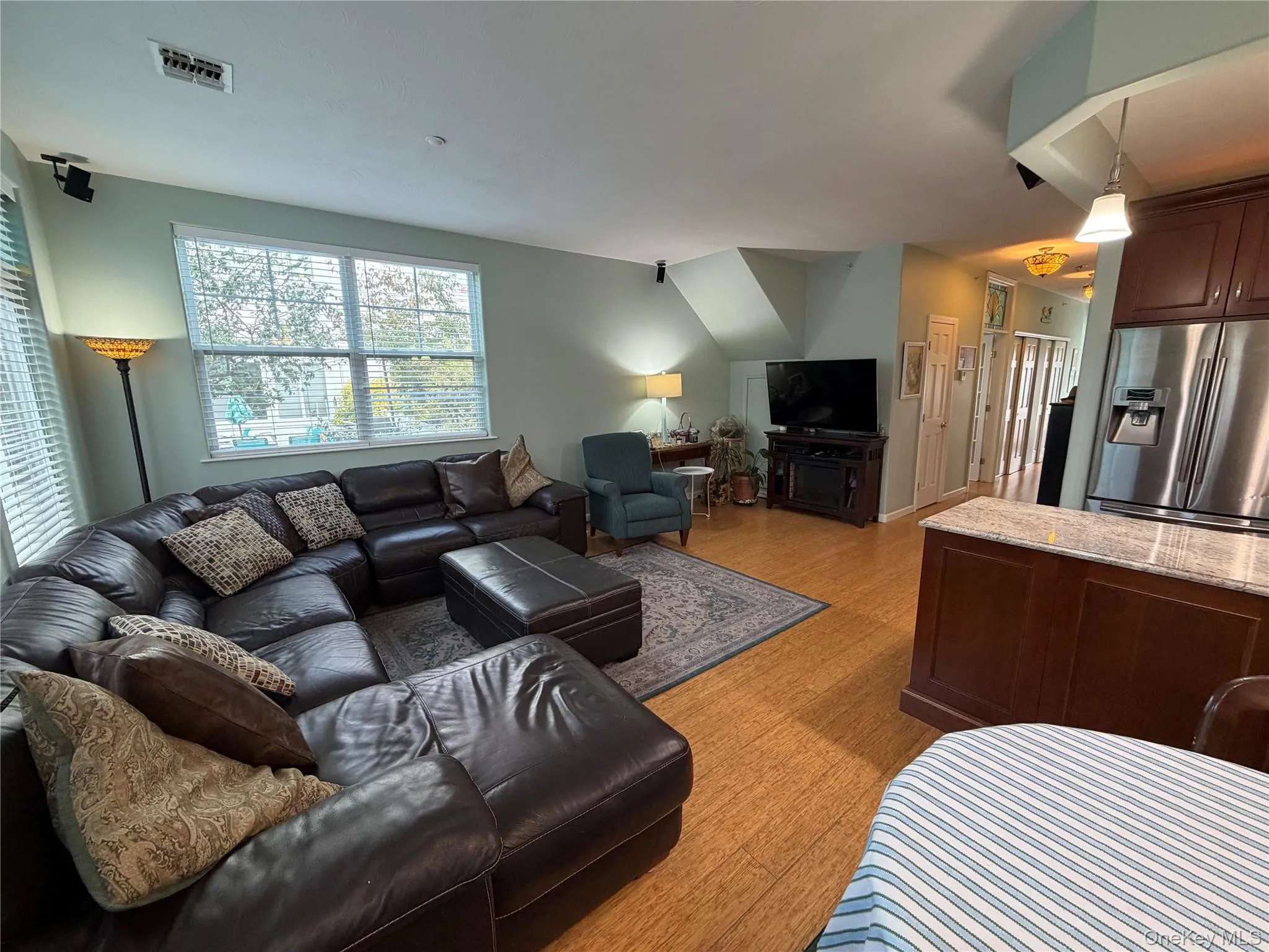 Living area with light wood-style flooring Living area with light wood-style flooring