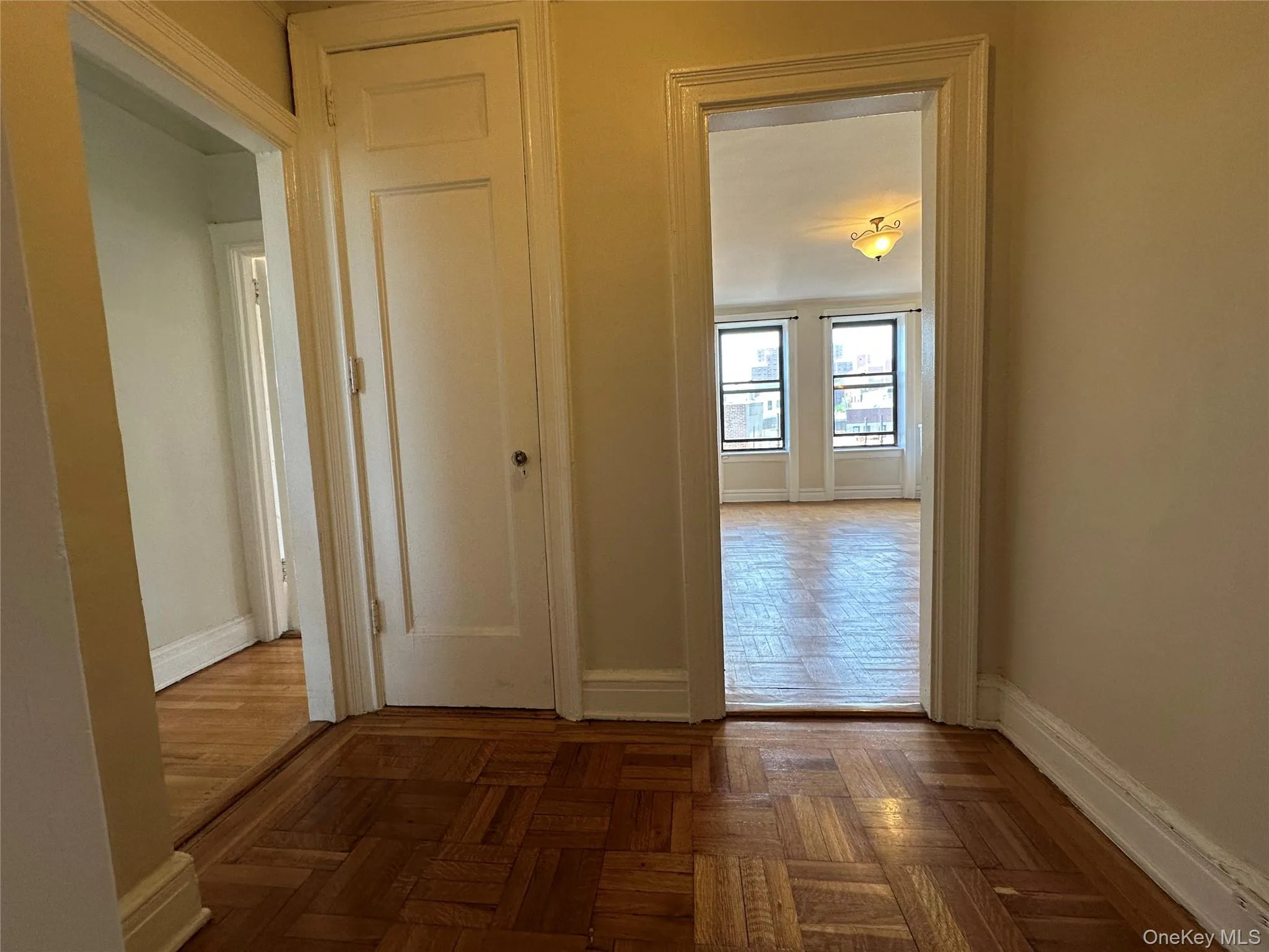 Hallway featuring baseboards Hallway featuring baseboards