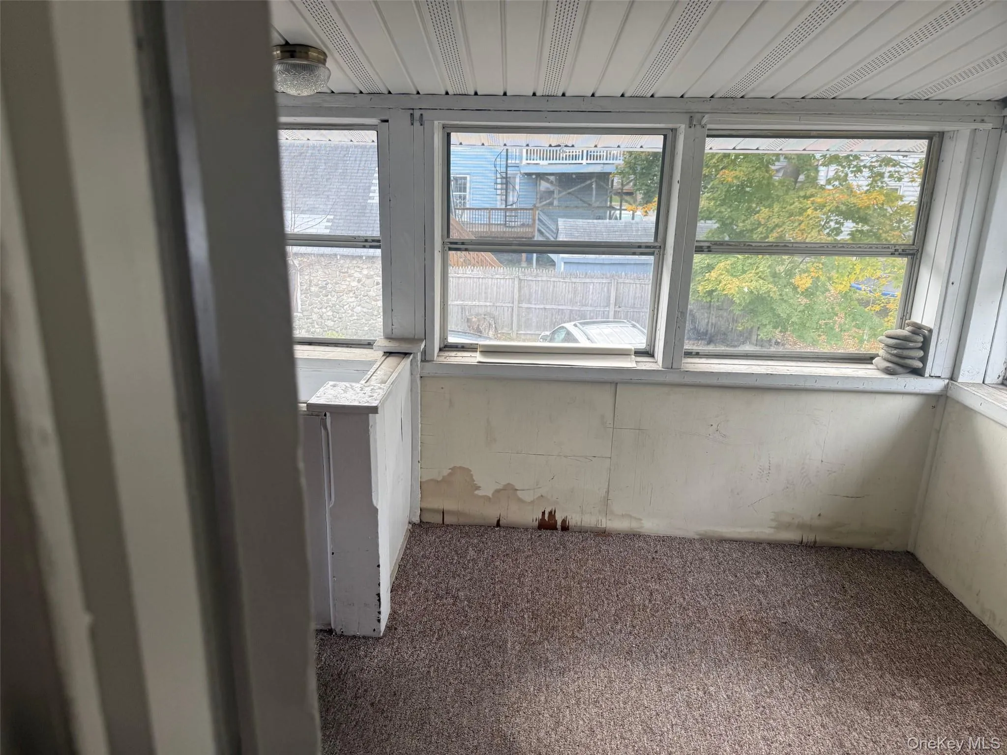 Unfurnished area featuring plenty of natural light Unfurnished area featuring plenty of natural light